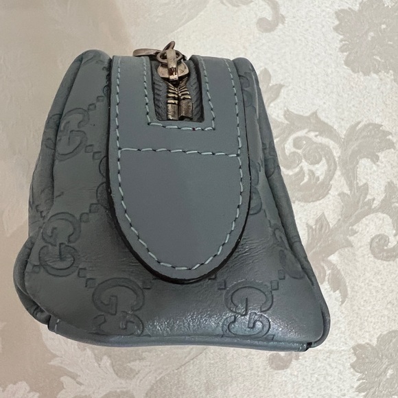 Gucci - authentic cosmetic pouch. Pairs beautifully with my Blue Coach handbag. - Picture 6 of 12